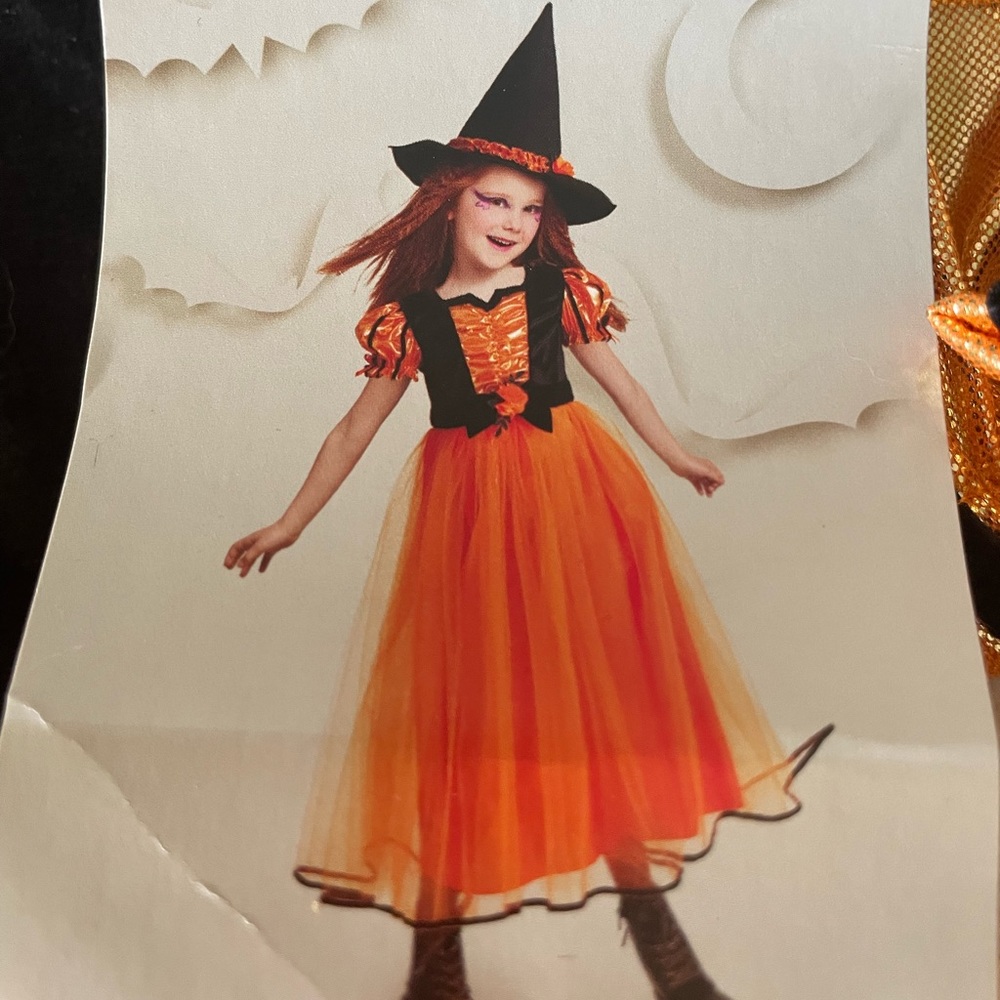 Witch costume. Size small. New in package. Deluxe costume.